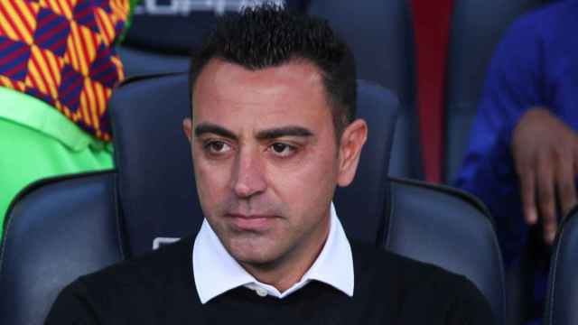 Xavi Hernández, en el banquillo del Camp Nou, durante el partido contra el Atlético / REDES