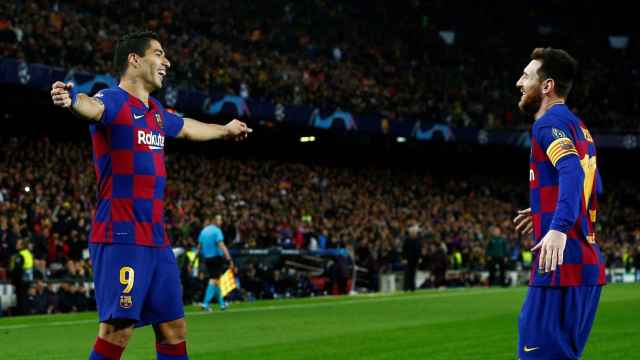 Leo Messi y Luis Suárez celebran el gol contra el Borussia Dortmund / EFE