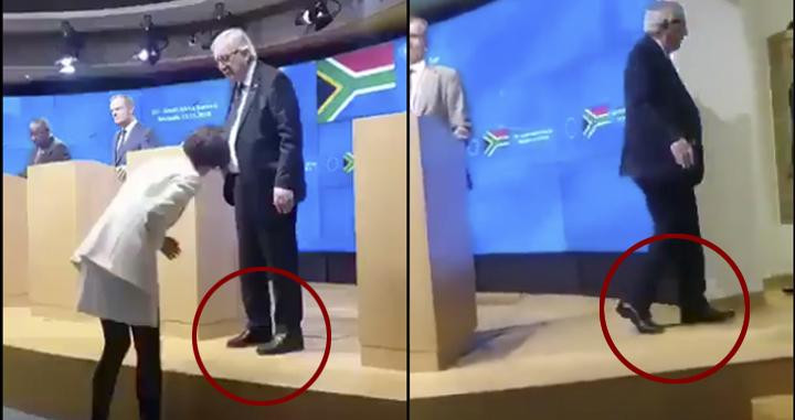 Juncker junto a su asesora cuando comprueba que lleva cada zapato de diferente color