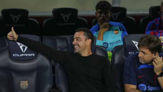 Xavi Hernández, en el banquillo del Barça antes del partido ante el Celta / EFE