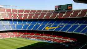 Imagen de archivo del slogan de Nike en el Camp Nou / EFE