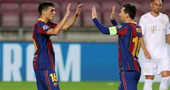 Pedri, celebrando un gol junto a Messi | EFE