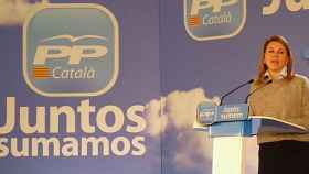 La secretaria general del PP, María Dolores de Cospedal, este viernes, durante su intervención en la inauguración de la convención popular con el lema Juntos sumamos