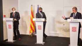 Los expresidentes Quim Torra, Carles Puigdemont y Artur Mas, en su comparecencia en Perpiñán / EFE