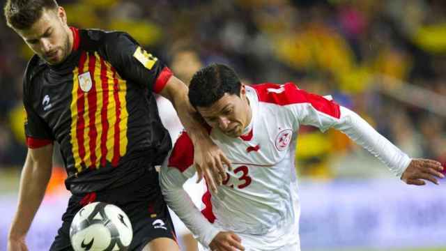 Imagen de archivo de Gerard Piqué en un partido con Catalunya / EFE