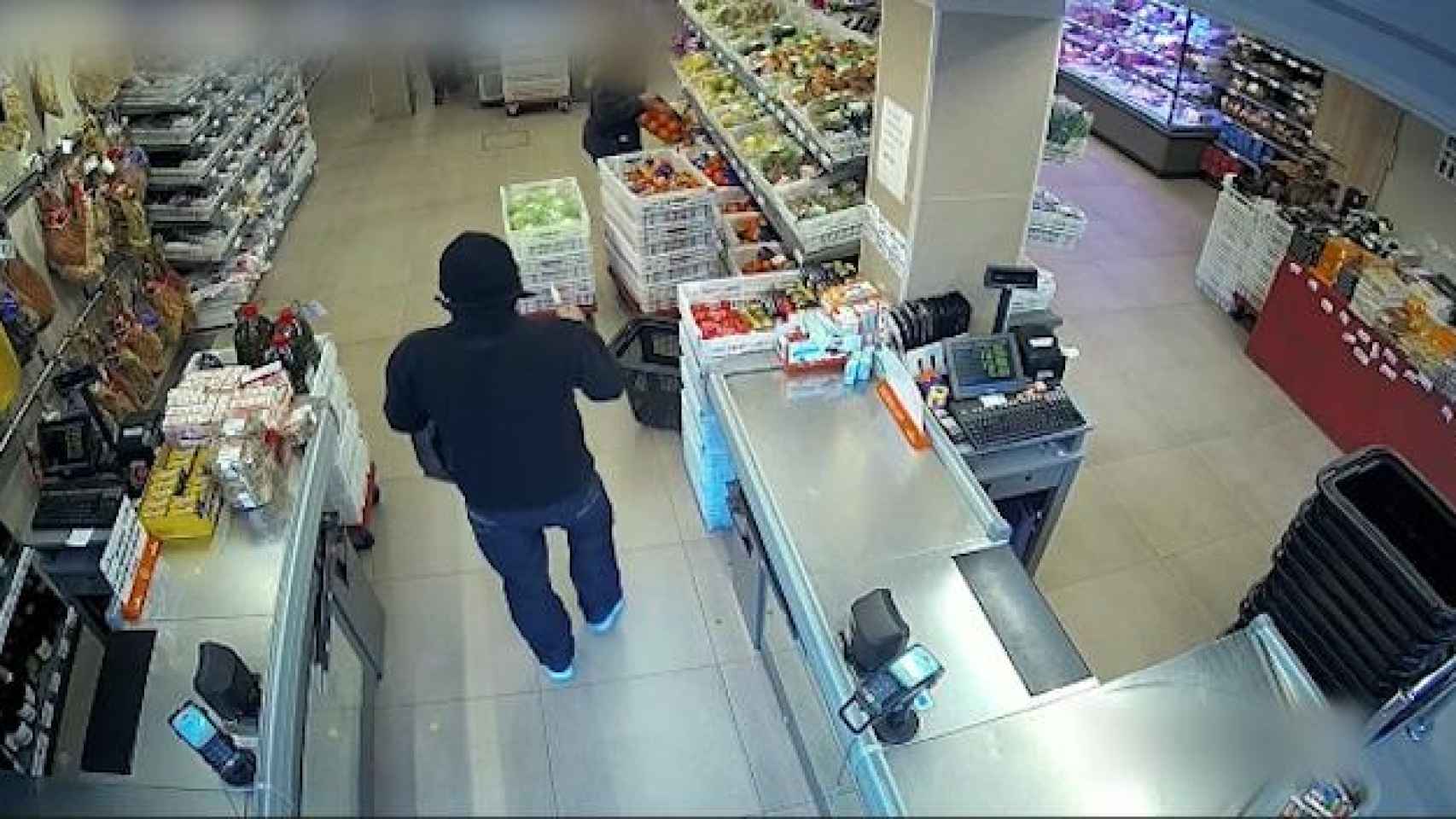 Un ladrón atraca una tienda a punta de cuchillo / MOSSOS