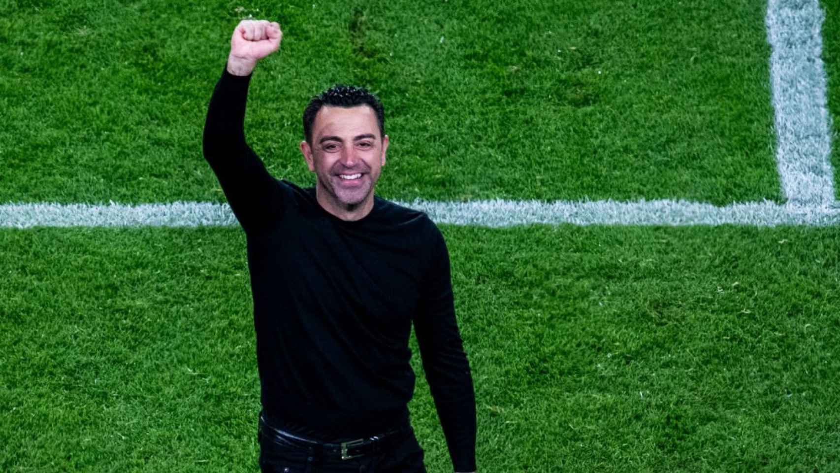 Xavi Hernández hace un gesto de celebración durante un partido del Barça