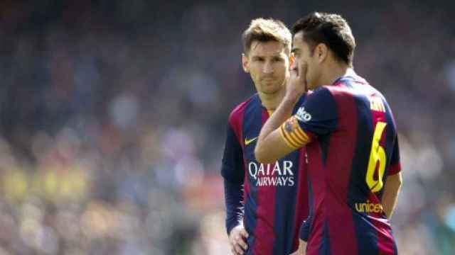 Xavi conversa con Messi