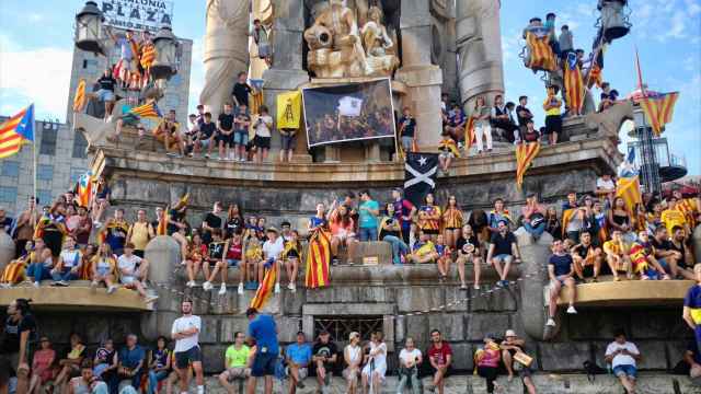 Manifestantes secesionistas, en la manifestación de la Diada en la Plaza de España de Cataluña