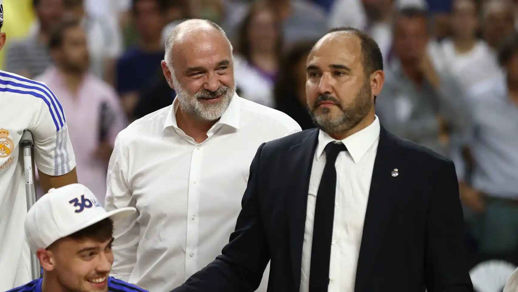 Chus Mateo, actual entrenador del Real Madrid, junto a Pablo Laso