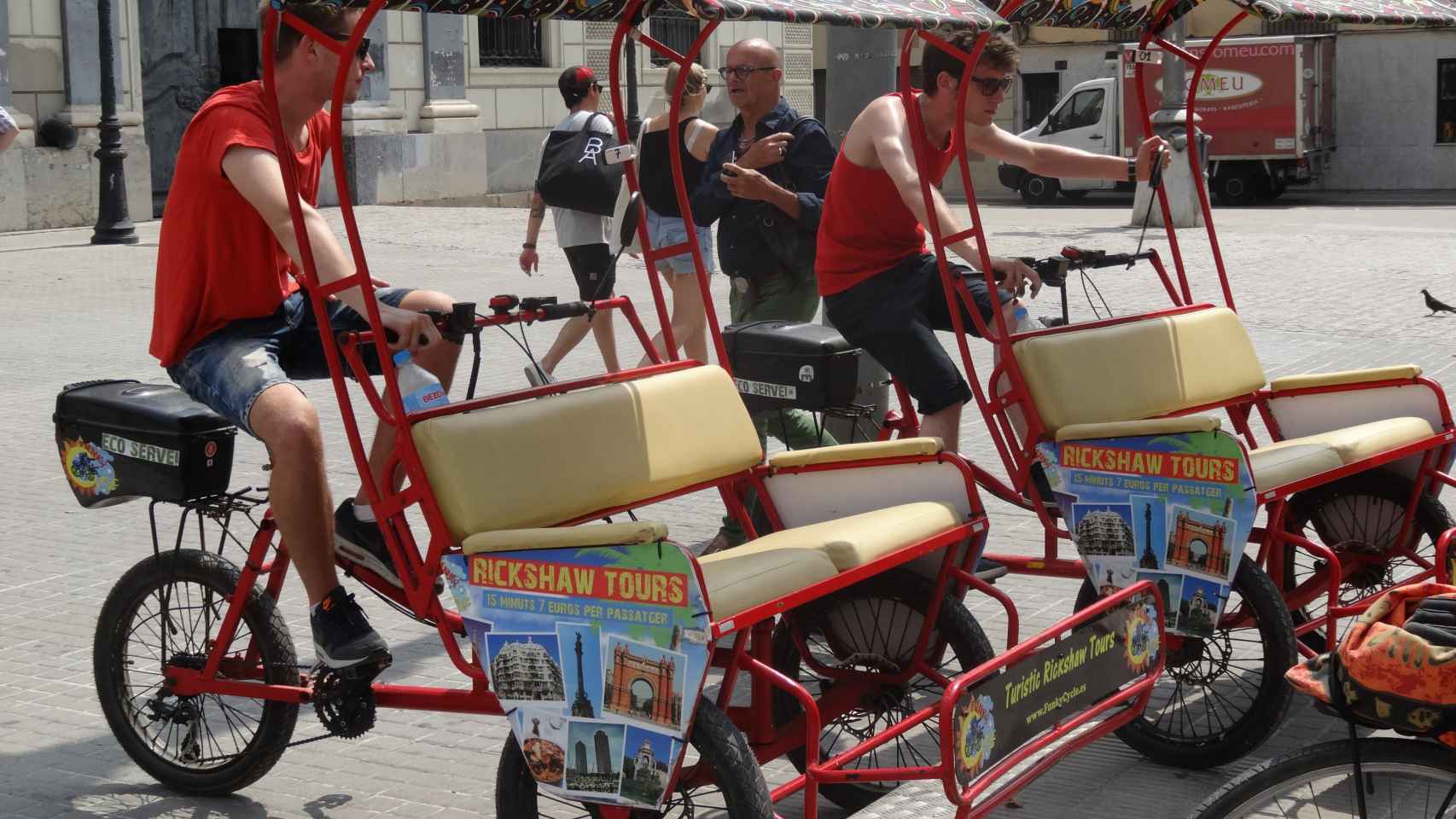 Conductores de bici-taxis / Jordi Ferrer