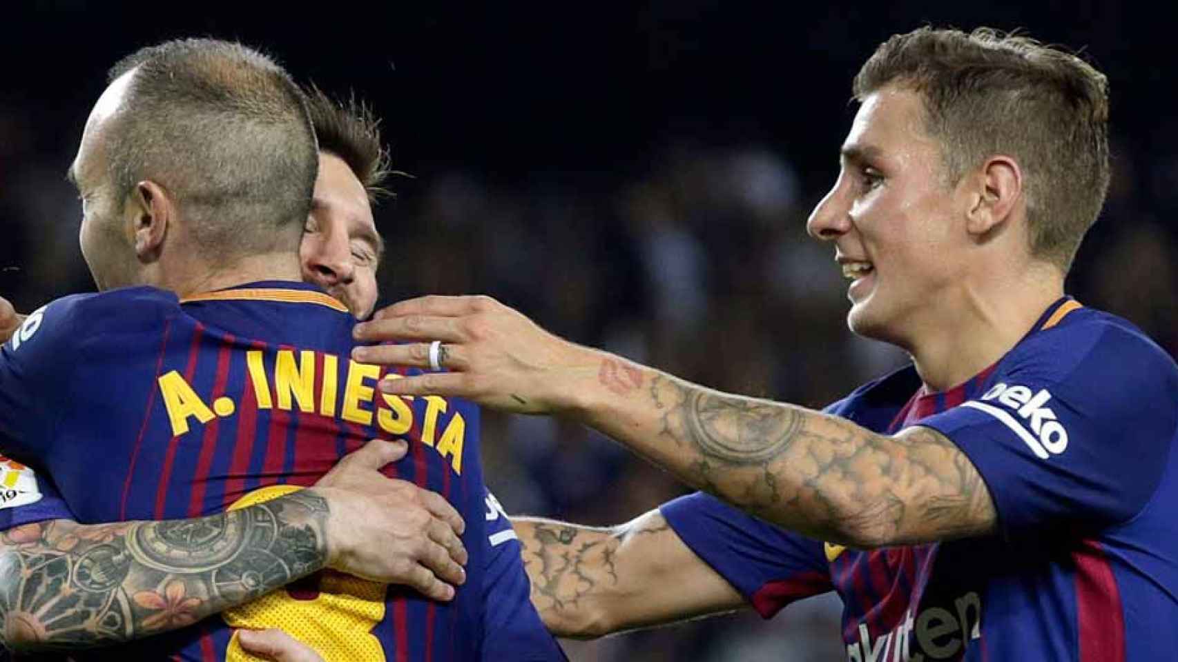 Messi, Iniesta y Digne celebran un gol del Barça ante el Málaga / EFE