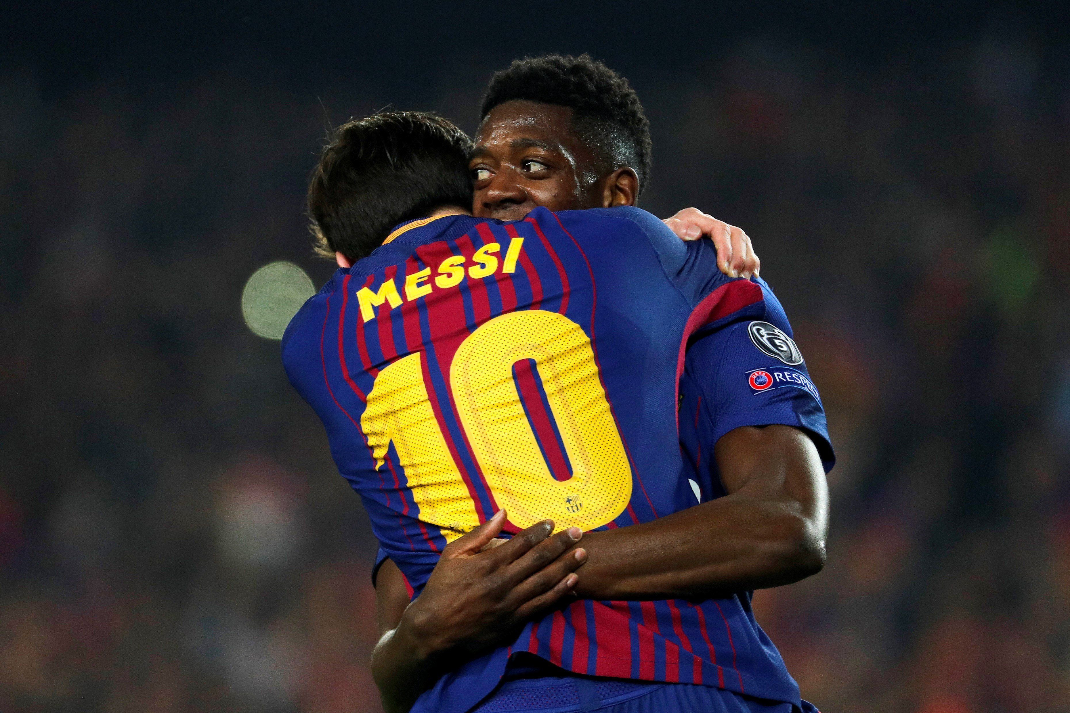 Messi y Dembélé celebrando uno de los tres goles del Barça al Chelsea / EFE