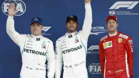 Bottas, Hamilton y Vettel, de izquierda a derecha, tras la calificación de este sábado para el GP del domingo / EFE