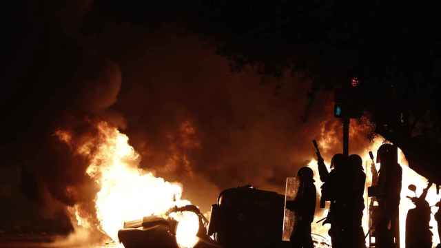 Policía Nacional durante la manifestación del 18 de octubre / EFE