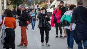 Una ciudadana en la Sagrada Família con mascarilla / EUROPA PRESS