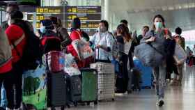 Colas en el aeropuerto del Prat durante la pandemia del covid-19 / EFE